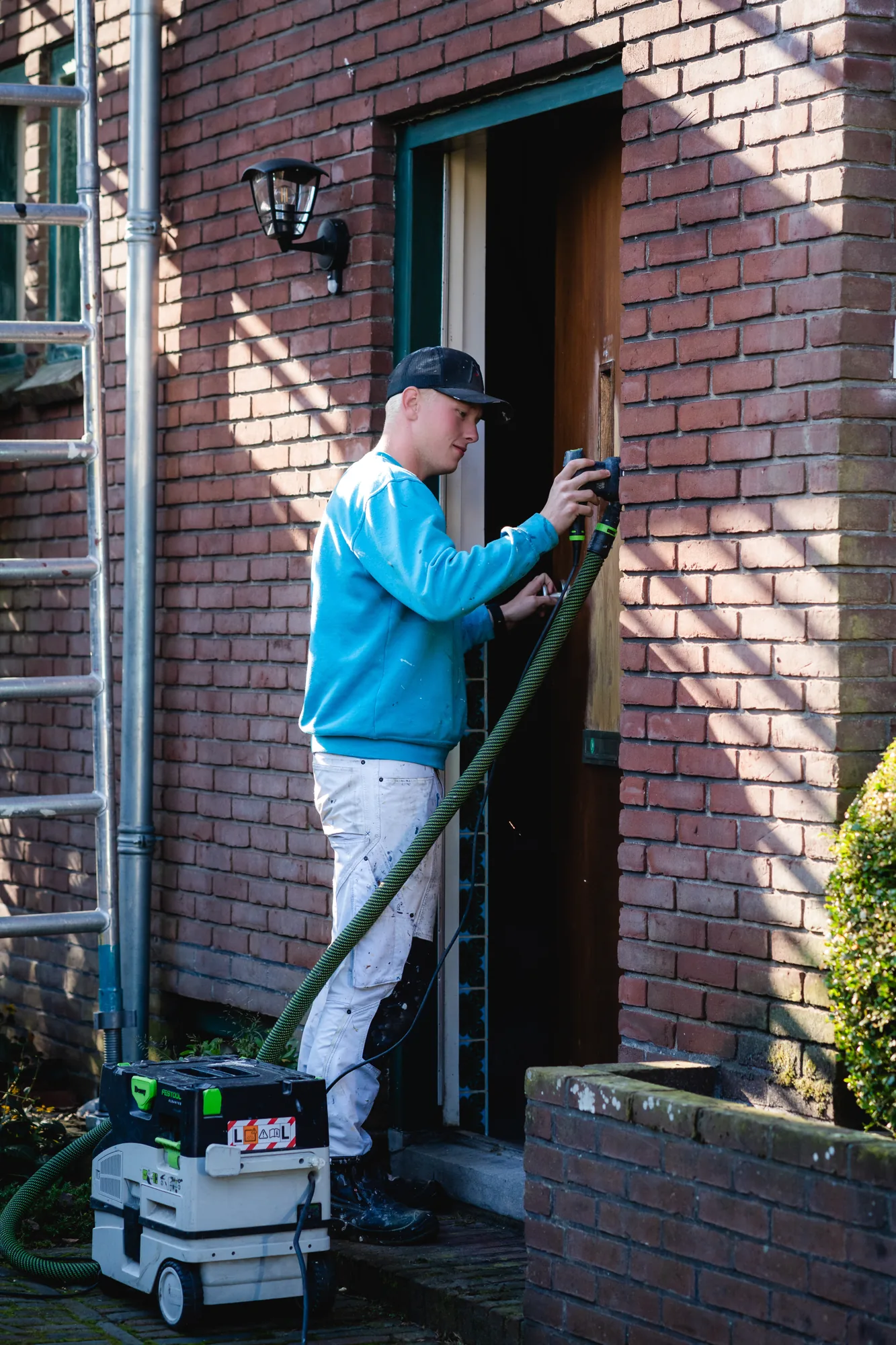 Schilder van Van Foeken bij een voordeur